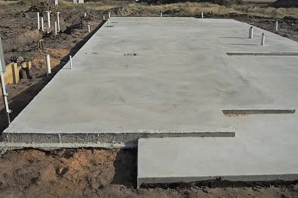 A concrete slab is being prepared for a new home by a foundation contractor San Francisco.