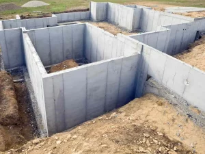 A house is being built with concrete walls.