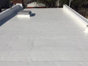 A white roof with a white coating on it commercial roofing.